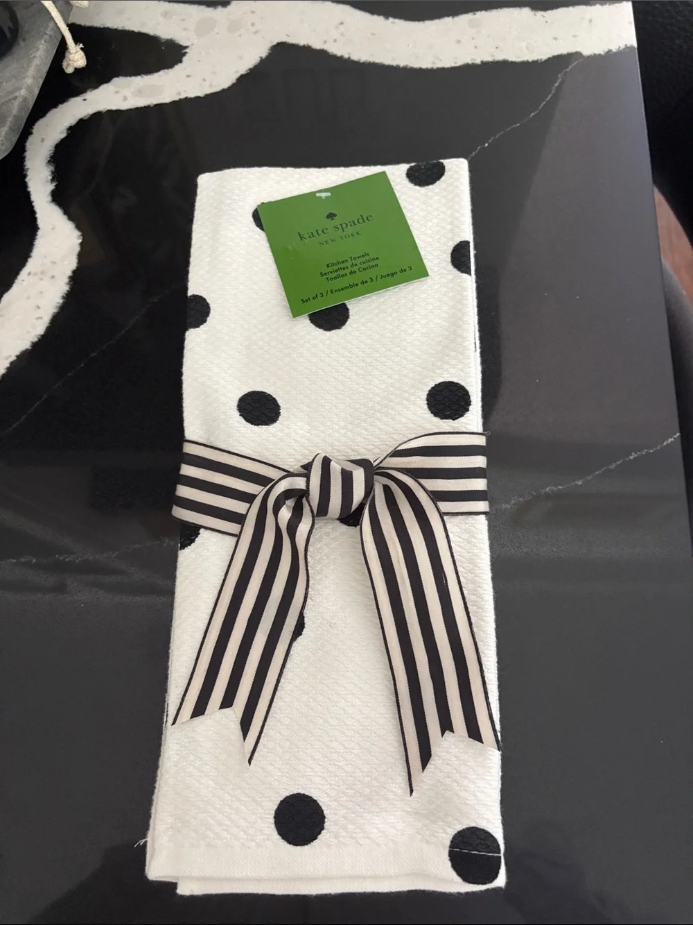 KATE SPADE Three black & white polka dot kitchen towels.